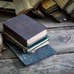 Vintage old books on wooden table